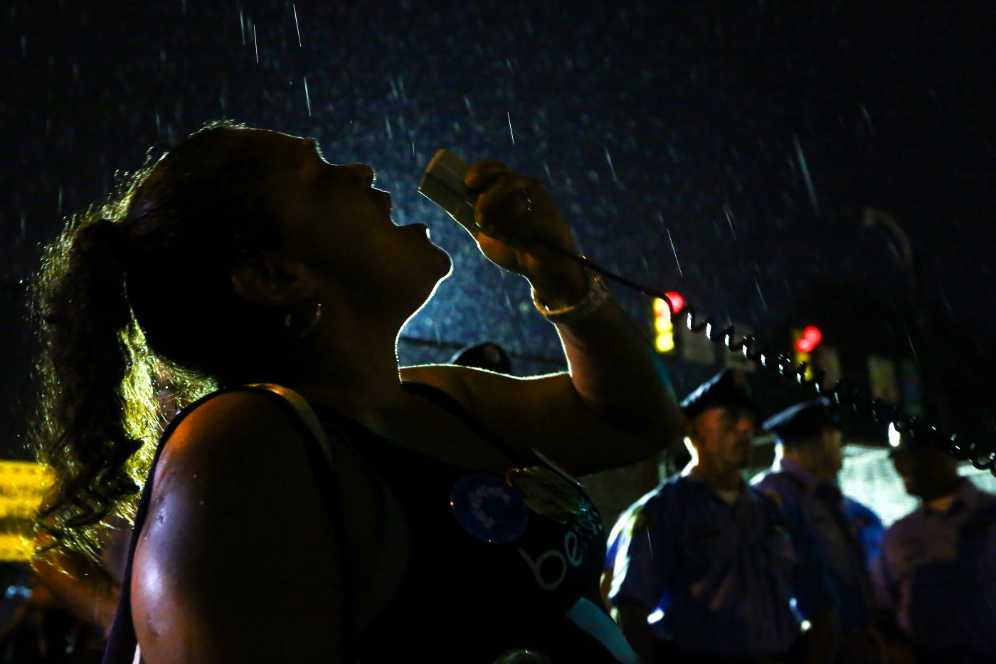 Priscila Ortiz, of Dallas, Texas, shouts into a megaphone "We wont vote for Hillary" outside the 2016 Democratic National Convention in Philadelphia, July 28.